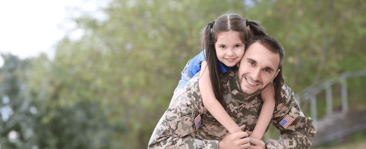 happy soldier with daughter